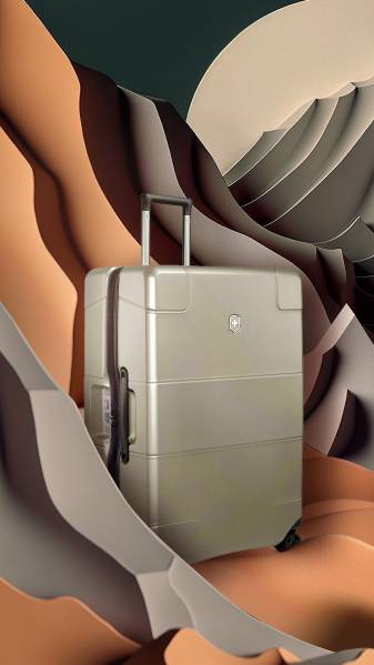 Abstract graphic presenting a suitcase as one of hills in a rocky desert